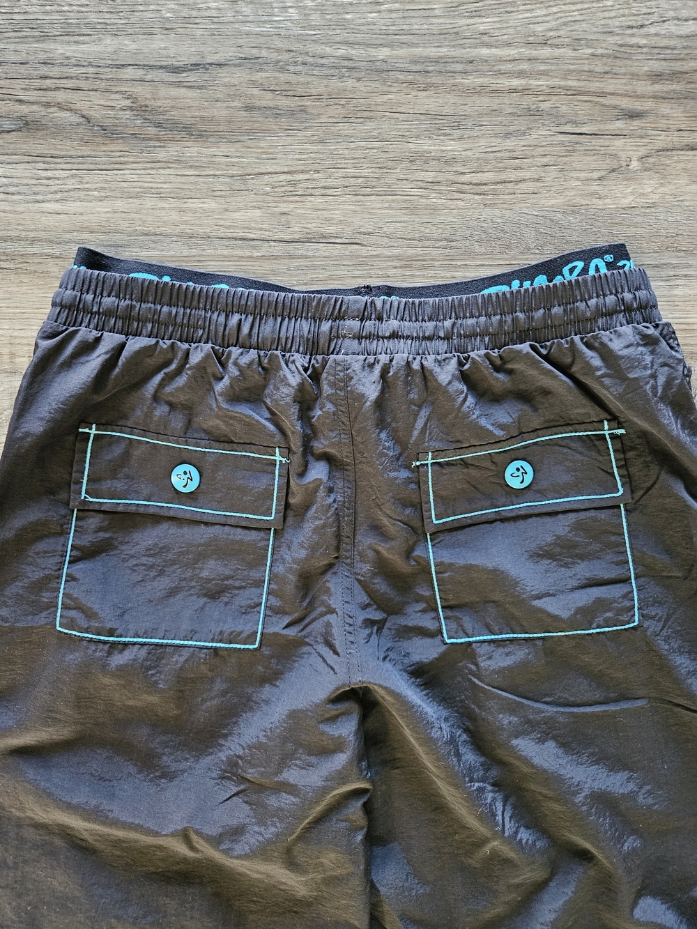 Zumba Fitness Men's Black Zip It Convertible Cargo Pants With Teal Embroidery - Picture 14 of 14